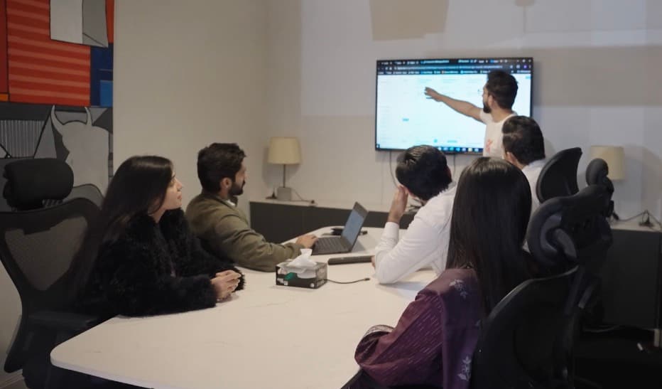 Exonix team reviewing a project on-screen